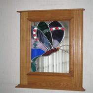 Miroir papillon cadre en chêne.